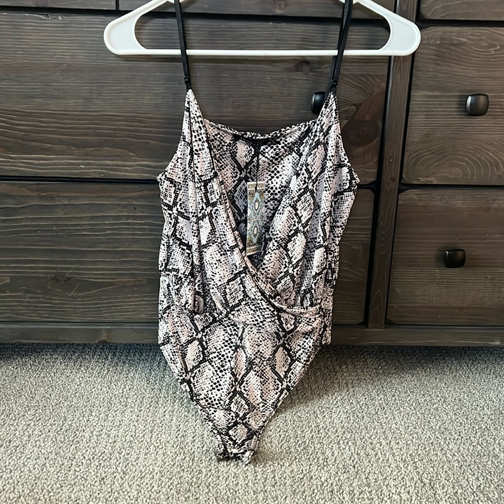Snake wrap Body suit with a scoop in the front